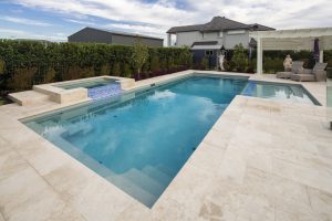 Compass Pools Australia Pool and spa combo with a beach attached